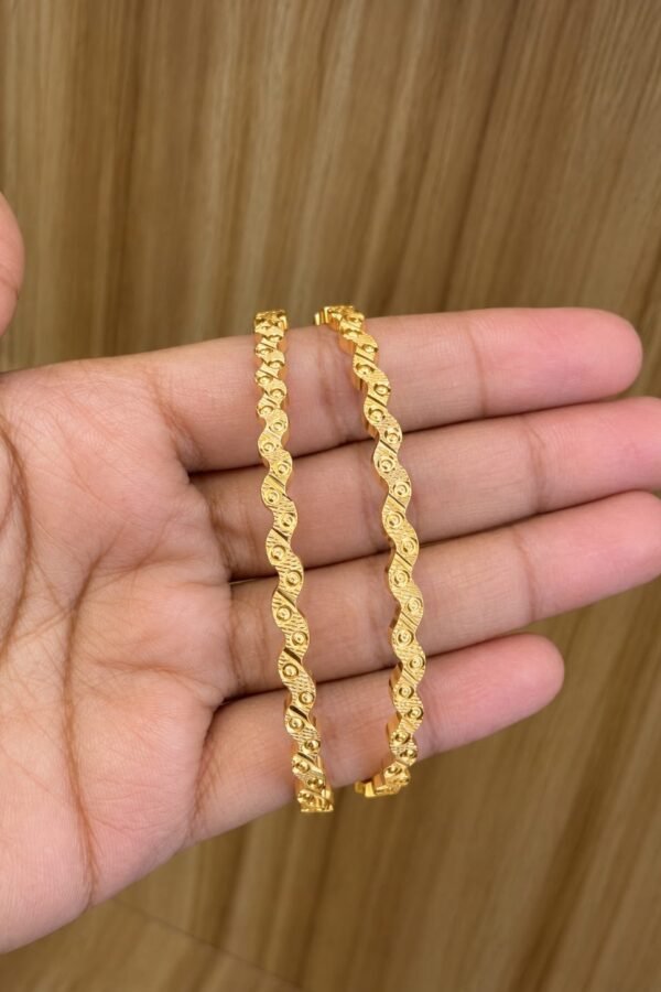 Silver gold plated wavy bangles